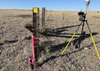 benchmark land surveyors fence line